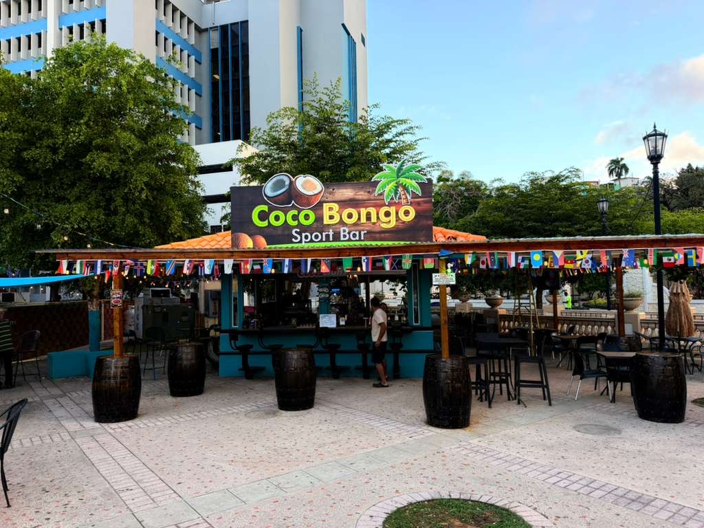 Coco Bongo Sport Bar PVC illuminated sign under palm roof