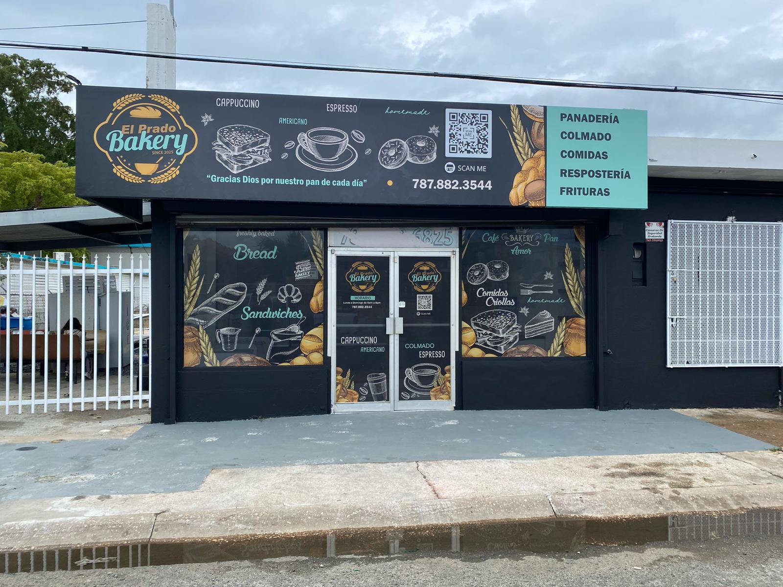 El Prado Bakery storefront with printed window graphics